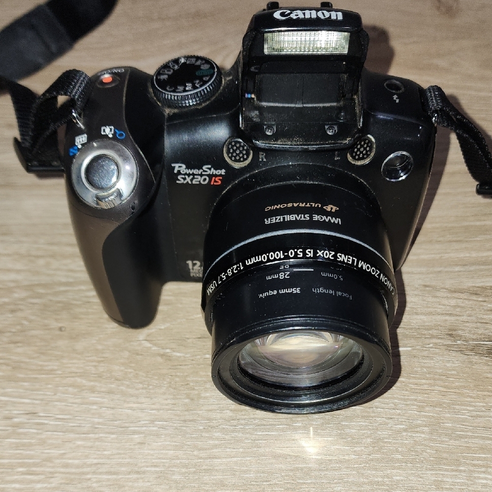 Canon Black Digital DSLR Camera with Ergonomic Grip and Optical Viewfinder